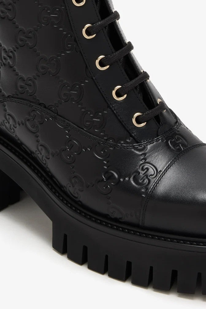 Black Enaraved ltalian Leather Ankle Boots