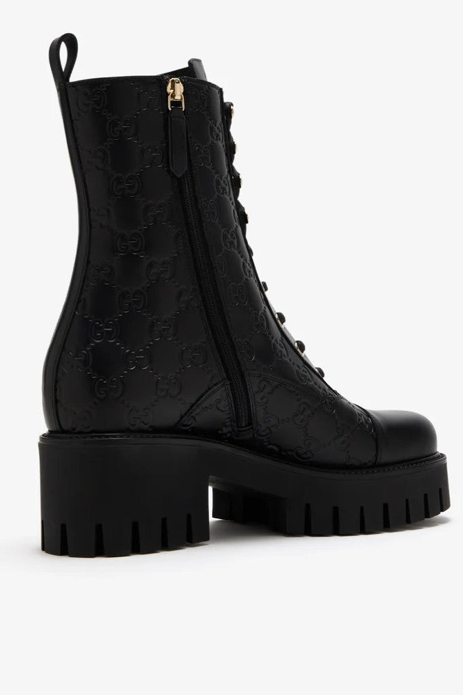 Black Enaraved ltalian Leather Ankle Boots