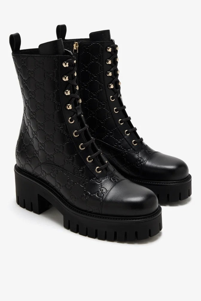 Black Enaraved ltalian Leather Ankle Boots