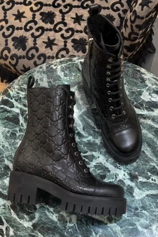 Black Enaraved ltalian Leather Ankle Boots