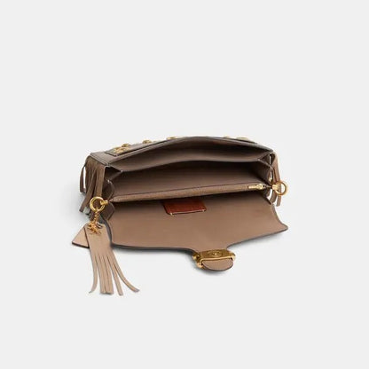 Gold Studded Tassel Shoulder Bag