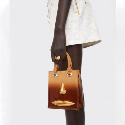Gold Details Human Face Design Brown Handbag