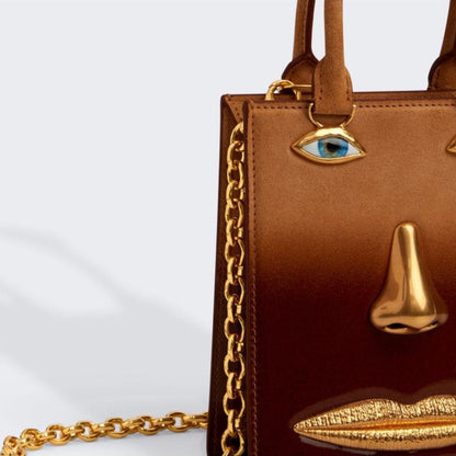 Gold Details Human Face Design Brown Handbag