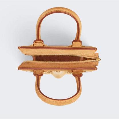 Gold Details Human Face Design Brown Handbag