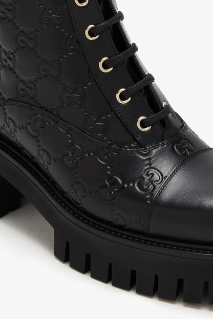 Black Enaraved ltalian Leather Ankle Boots