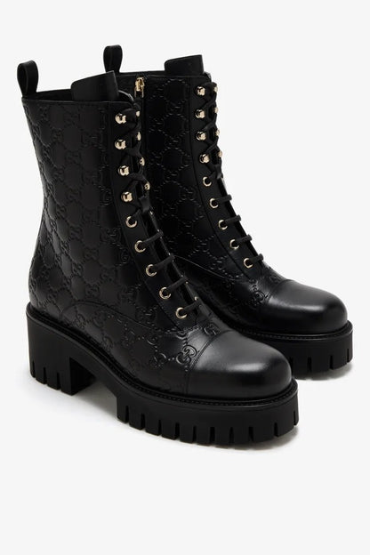 Black Enaraved ltalian Leather Ankle Boots